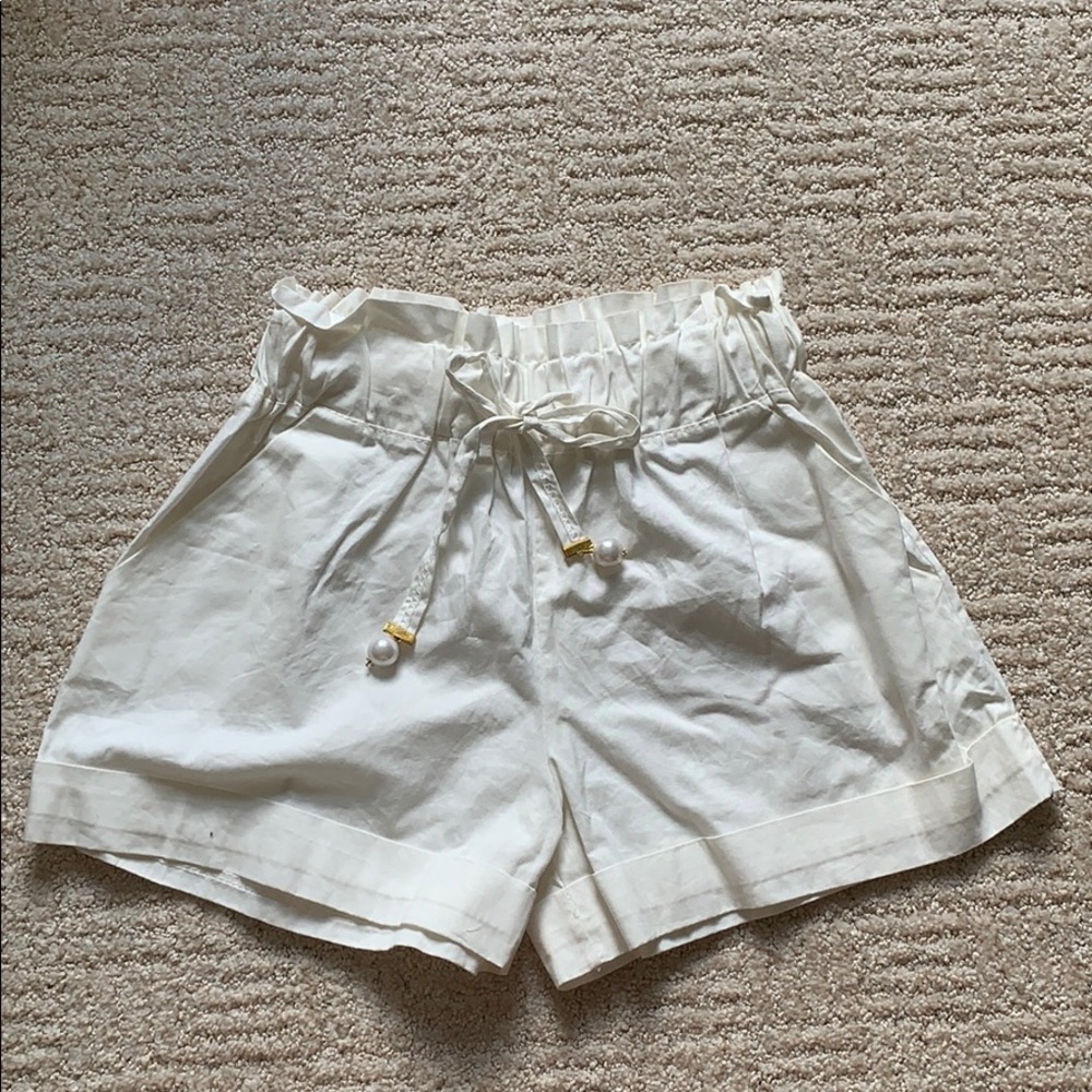 Cinched waist shorts with pearl and gold detailing